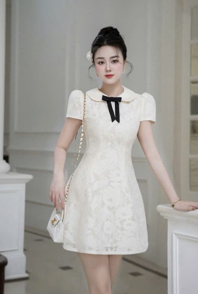 Đầm tiểu thư trắng cổ nơ đen